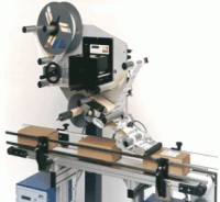 LABEL PRINTING MACHINES AND ADHESIVE SYSTEMS MACHINES